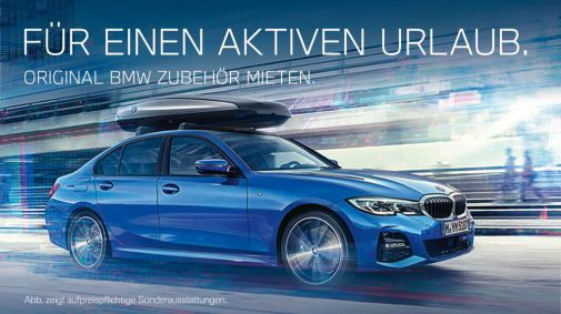 blauer BMW 3er mit montierter Dachbox